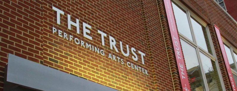 The Trust Performing Arts Center exterior sign.